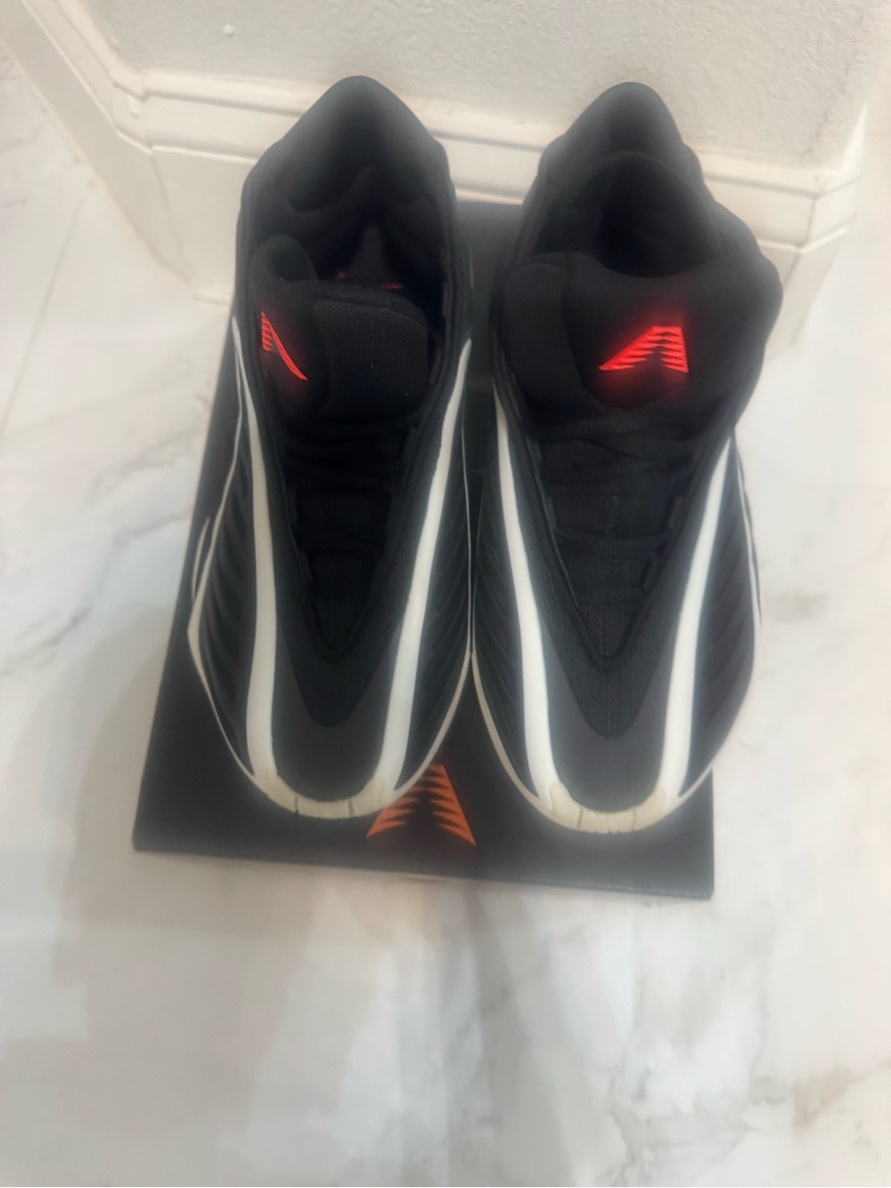 Adidas/Anthony Edwards Boy’s Black Sneakers with White Stripes and Red Accents